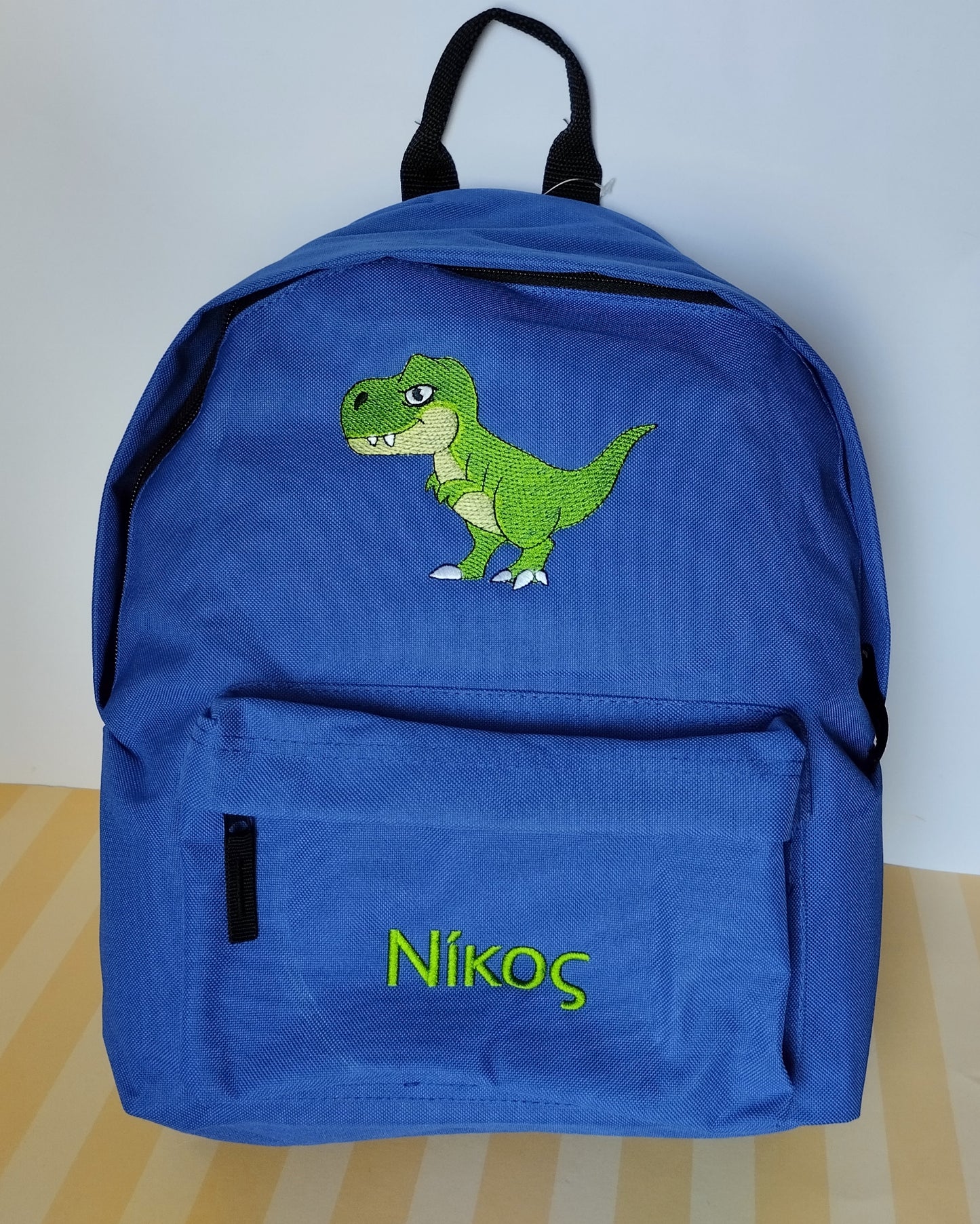 Dinosaur and name or text on backpack, Personalized, Machine embroidered, ideal for school, outdoor activities