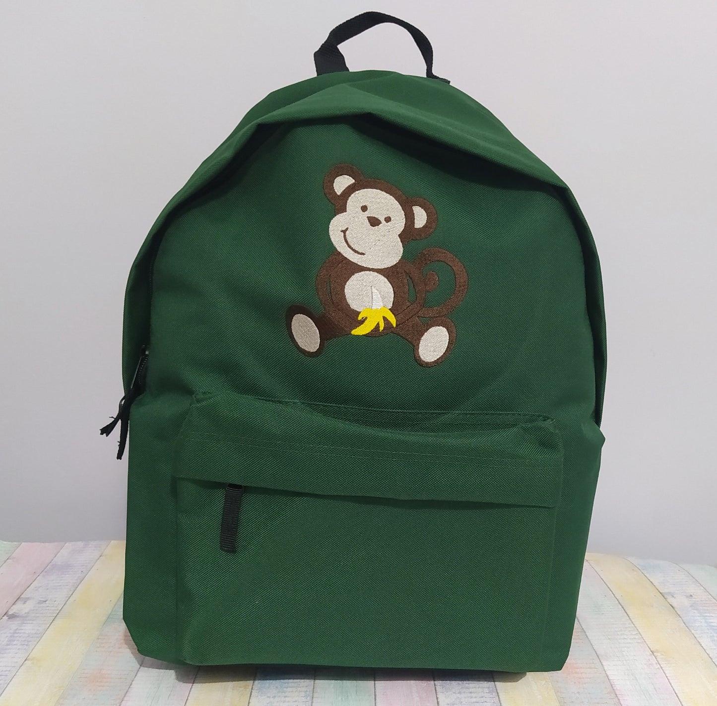 Monkey eating banana and name or text on backpack, Personalized, Machine embroidered, ideal for school, outdoor activities